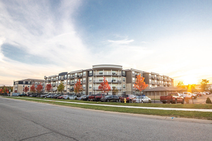 Exterior photo of The Verge Apartments in the fall season.