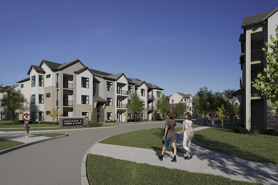 Not all Greenwood apartment communities offer coach homes like Crossing 5 does. Two women walking through an apartment community